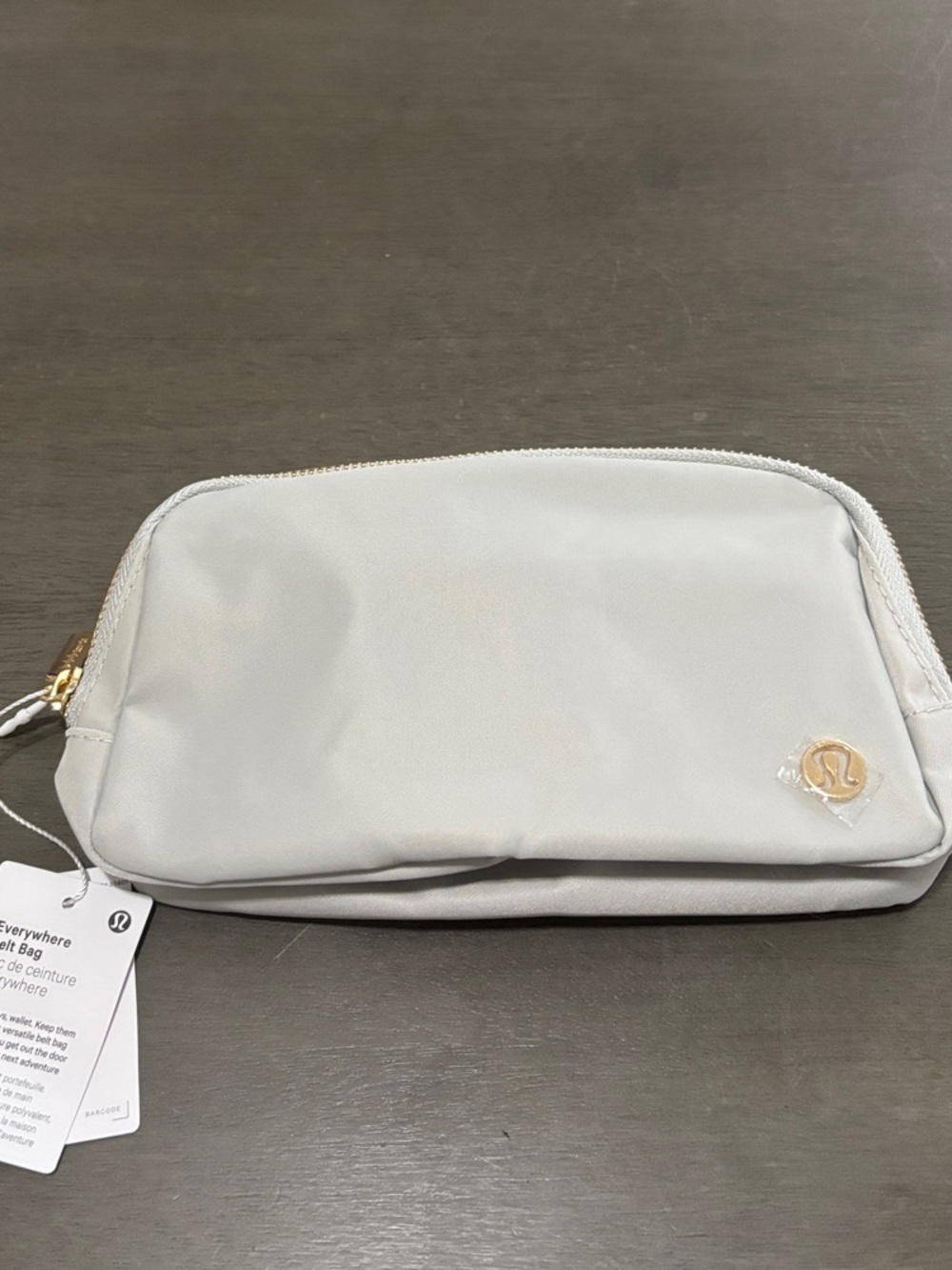 lululemon athletica Light Gray Cosmetic Pouch with Gold Logo